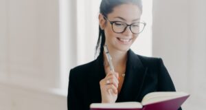 Business woman reading a book